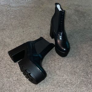 Black heeled platform boots